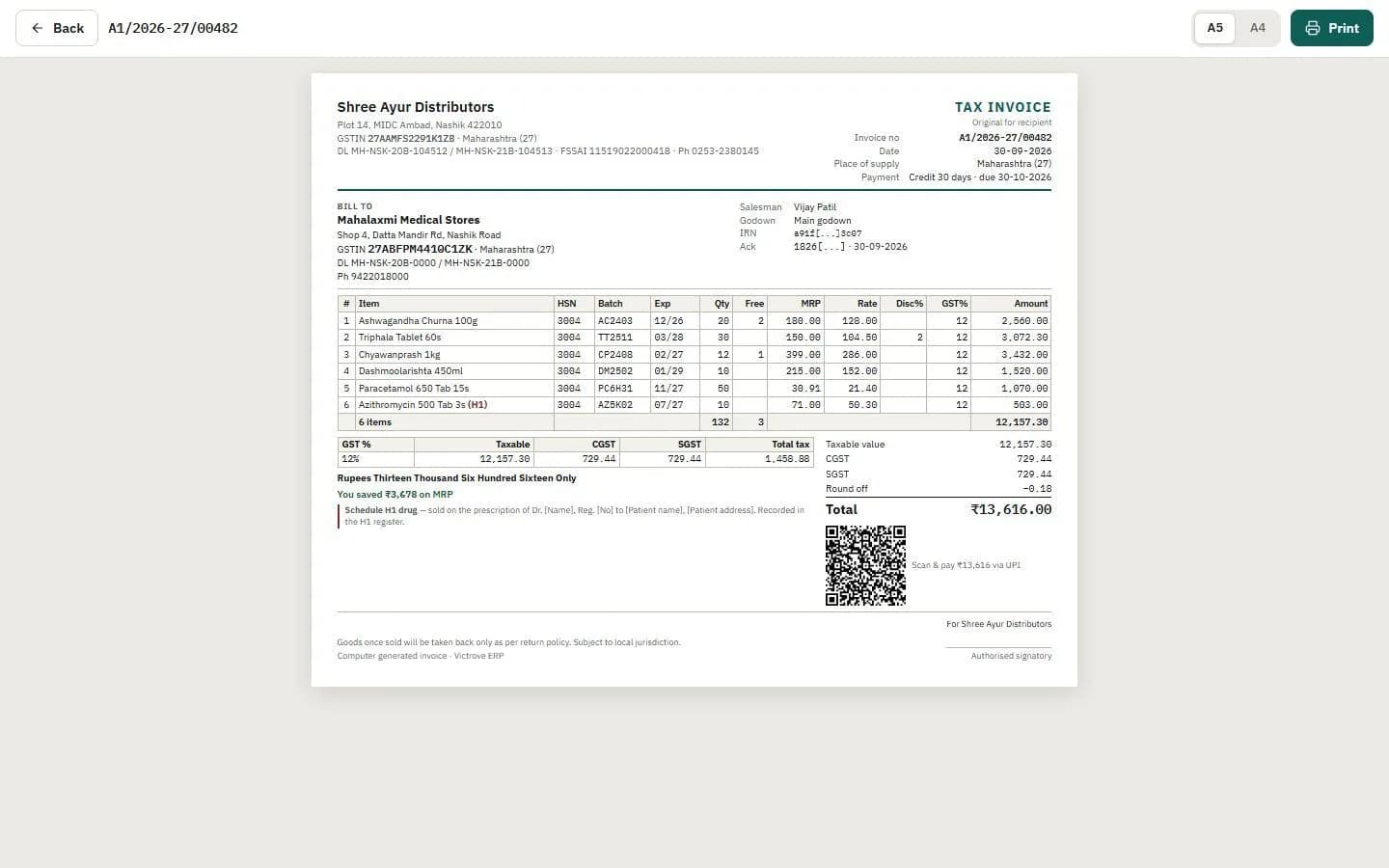 Printed GST tax invoice with UPI QR code and MRP savings line